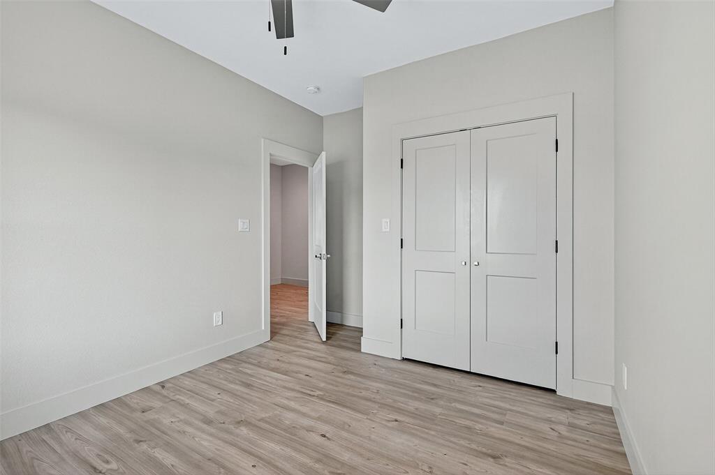 4805 Dry Creek Road Sherman, TX 75092 - Photo 27 of 29 a view of empty room with wooden floor