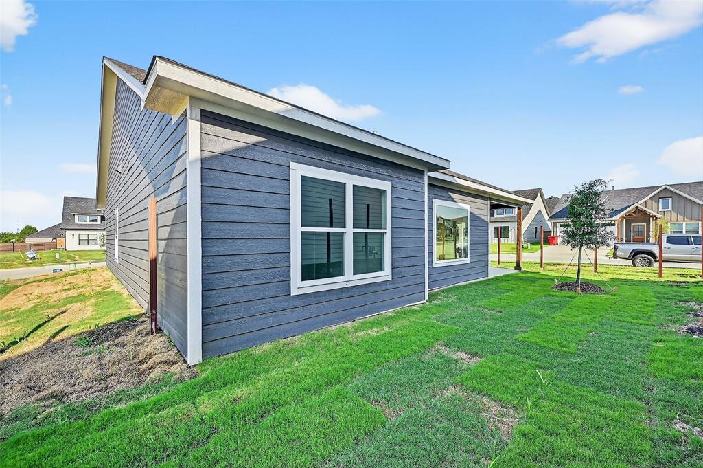 4805 Dry Creek Road Sherman, TX 75092 - Photo 29 of 29 a view of backyard of house with green space