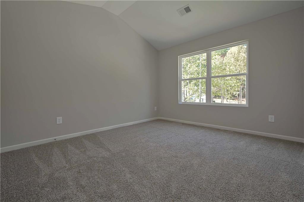 448 The Boulevard Newnan, GA 30263 - Photo 24 of 39 an empty room with a window