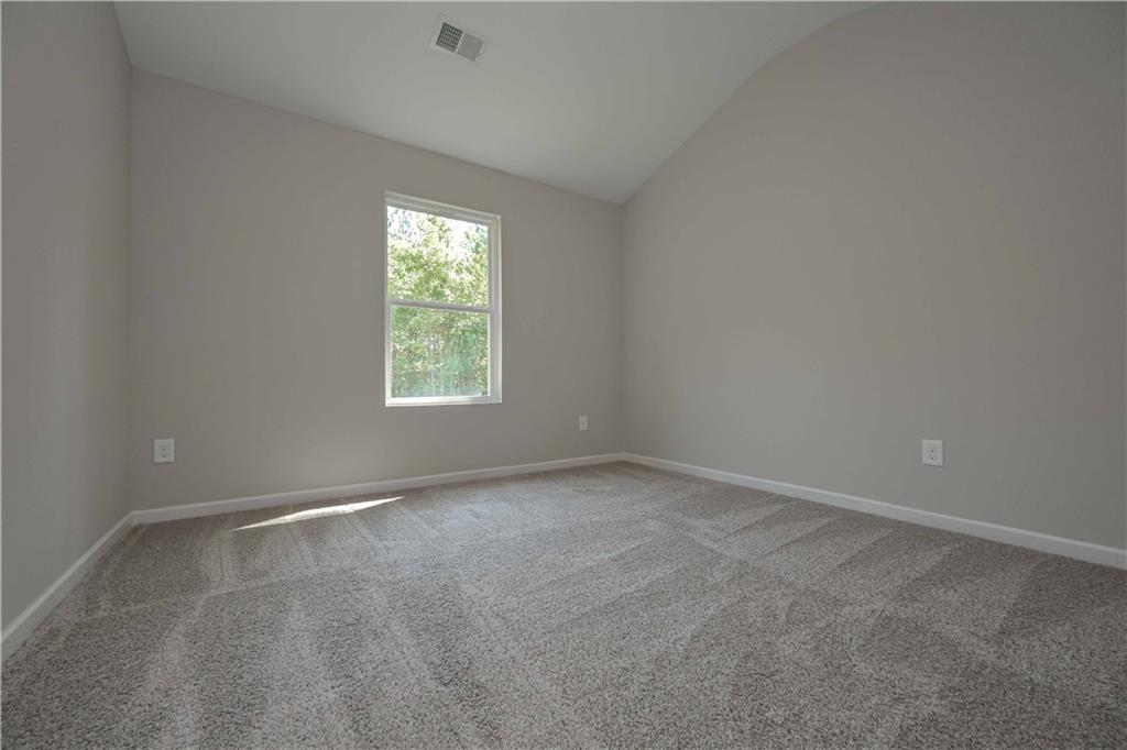 448 The Boulevard Newnan, GA 30263 - Photo 27 of 39 an empty room with a window