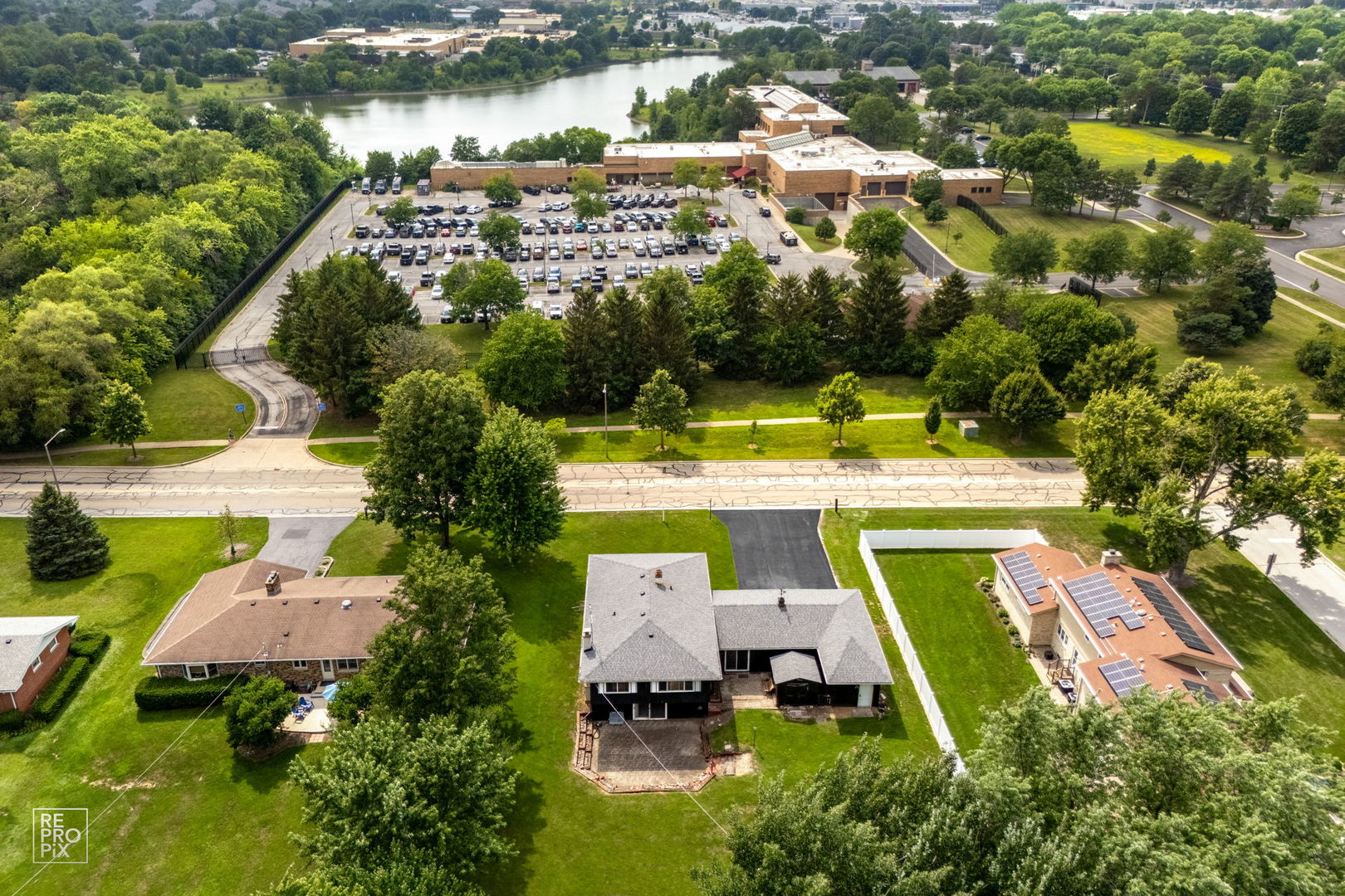 7S261 South River Road Naperville, IL 60540 - Photo 8 of 18 an aerial view of a house with a swimming pool yard and outdoor seating