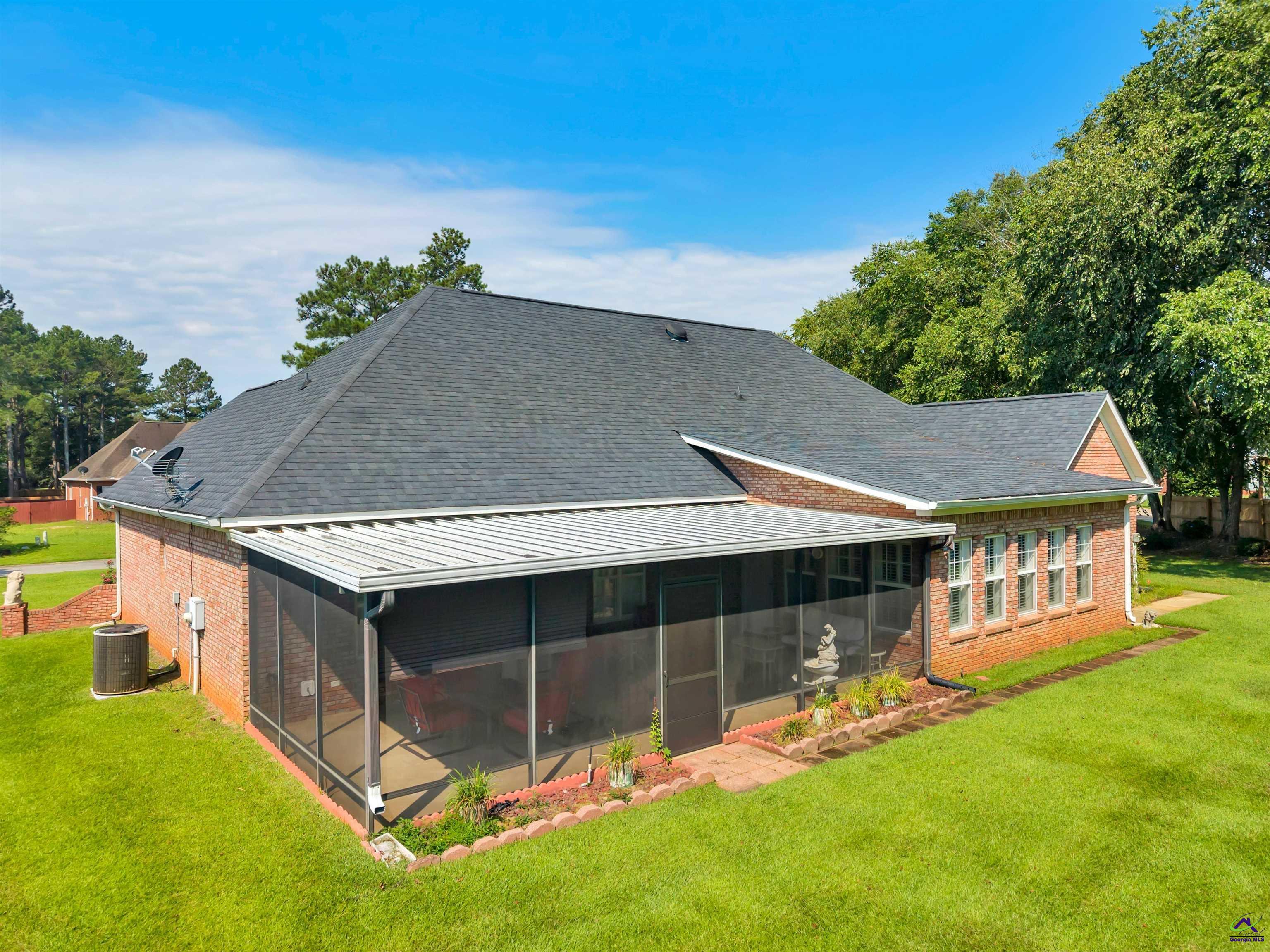 206 North Hampton Place Perry, GA 31069 - Photo 9 of 20 an aerial view of a house having swimming pool garden and patio