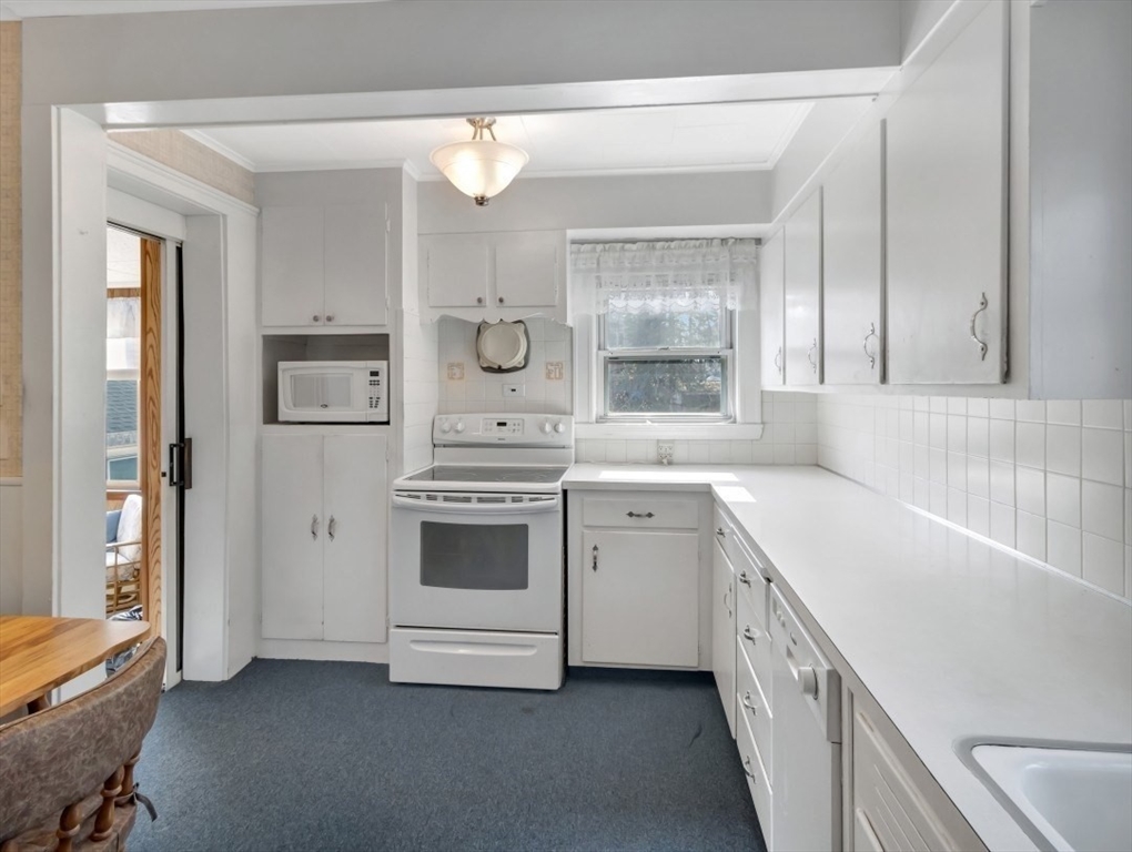 10 Allison Road Saugus, MA 01906 - Photo 12 of 42 a kitchen with a stove and a sink