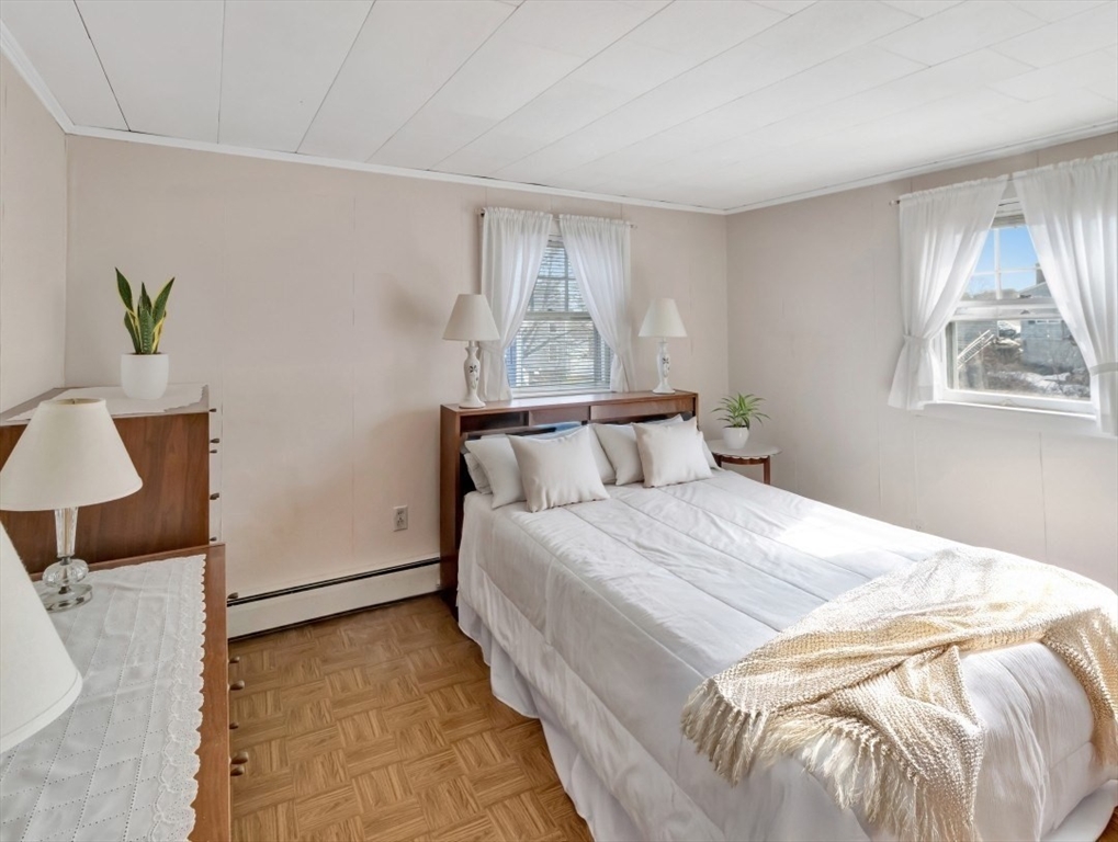 10 Allison Road Saugus, MA 01906 - Photo 25 of 42 a bedroom with a bed and window