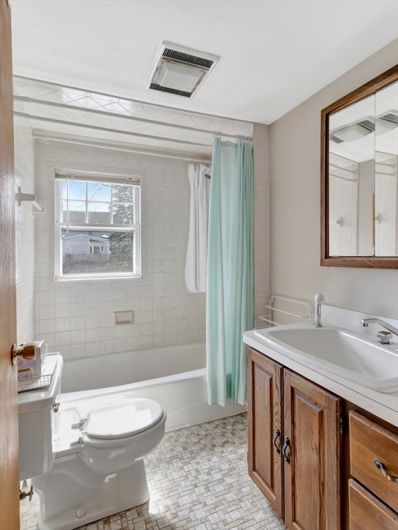 10 Allison Road Saugus, MA 01906 - Photo 26 of 42 a bathroom with a sink a toilet and shower