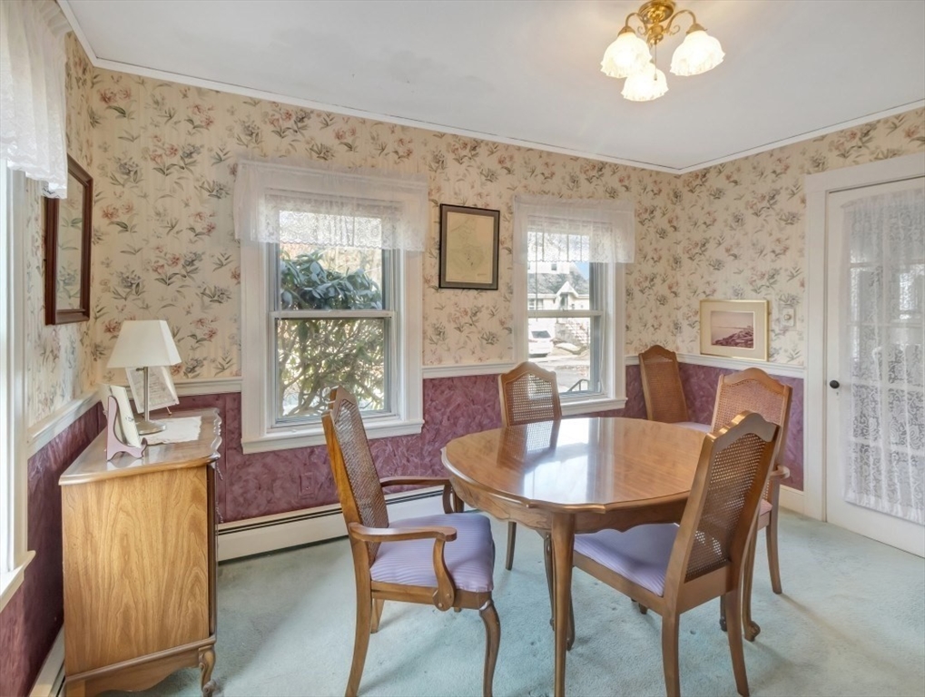 10 Allison Road Saugus, MA 01906 - Photo 9 of 42 a view of a dining room with furniture window and outside view