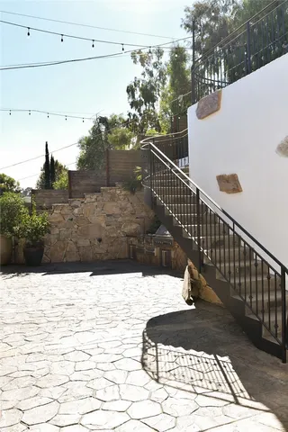 a view of street from balcony