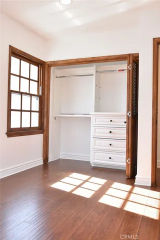 wooden floor and window in a room