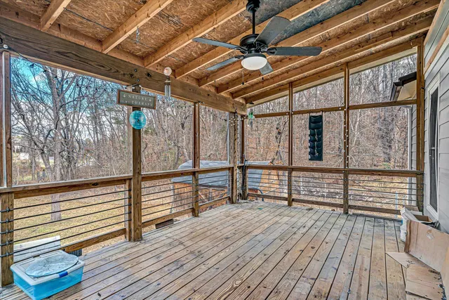a view of outdoor space with wooden floor