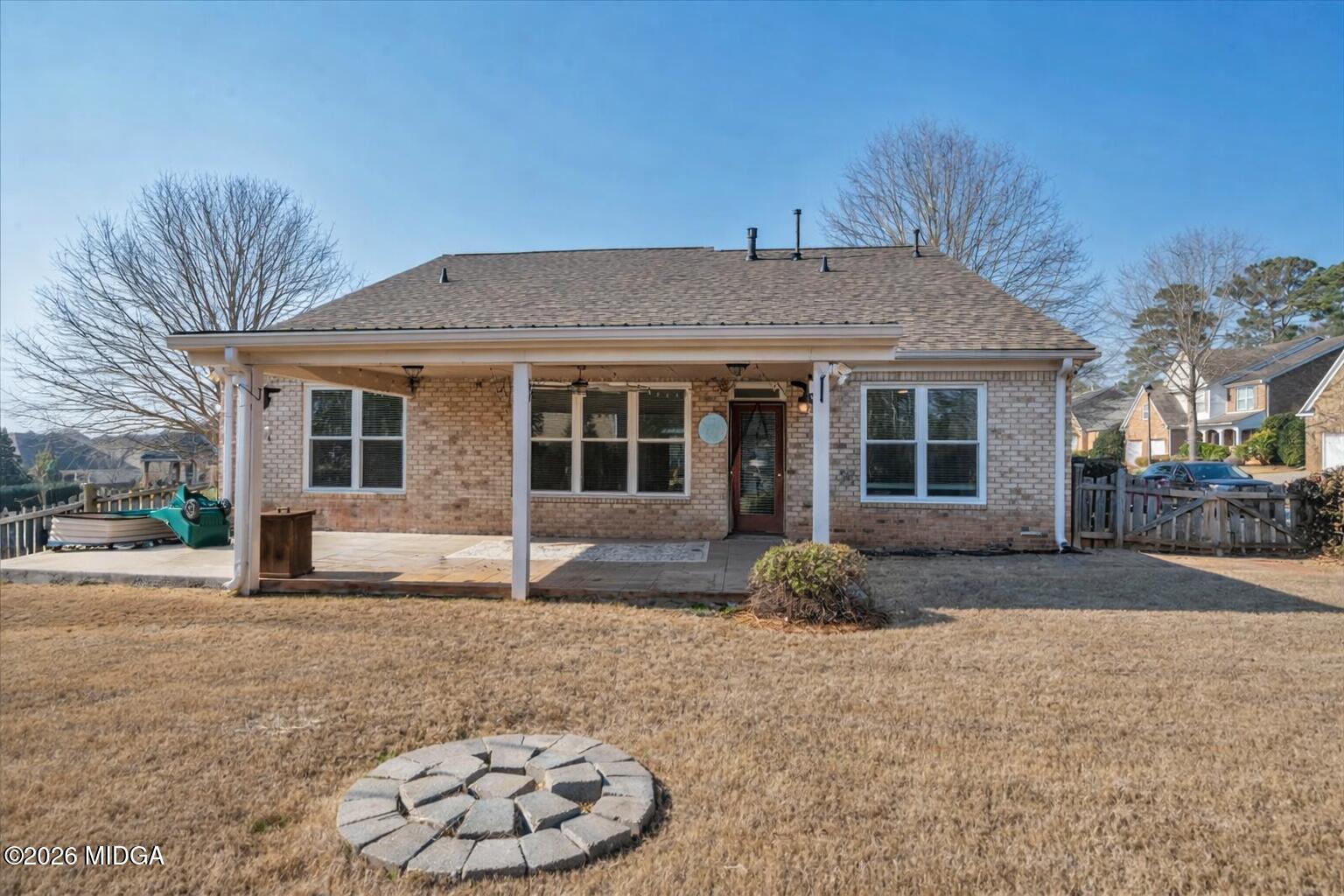 102 Fairways Court Macon, GA 31220 - Photo 40 of 47 a house view with a sitting space and garden