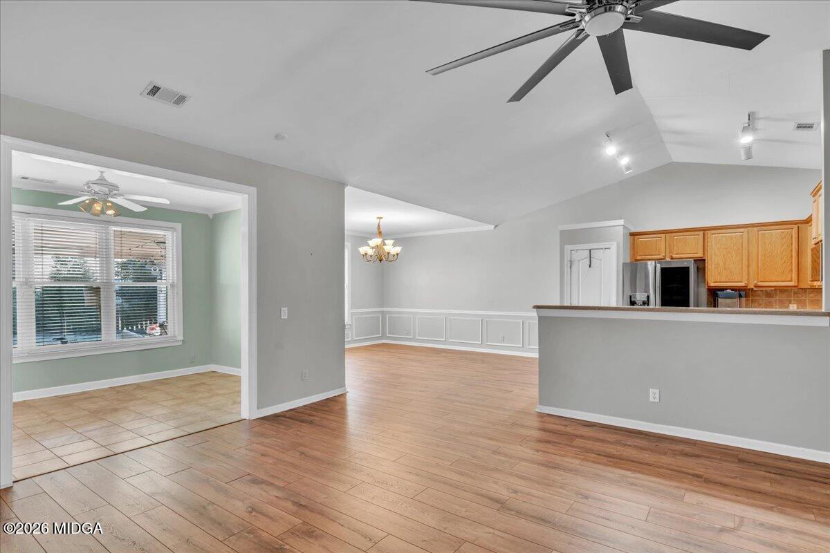 102 Fairways Court Macon, GA 31220 - Photo 7 of 47 a view of empty room with wooden floor and fan