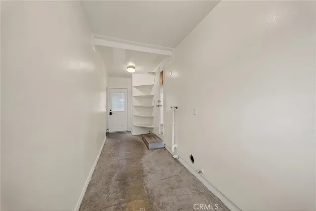 a view of an empty walk in closet