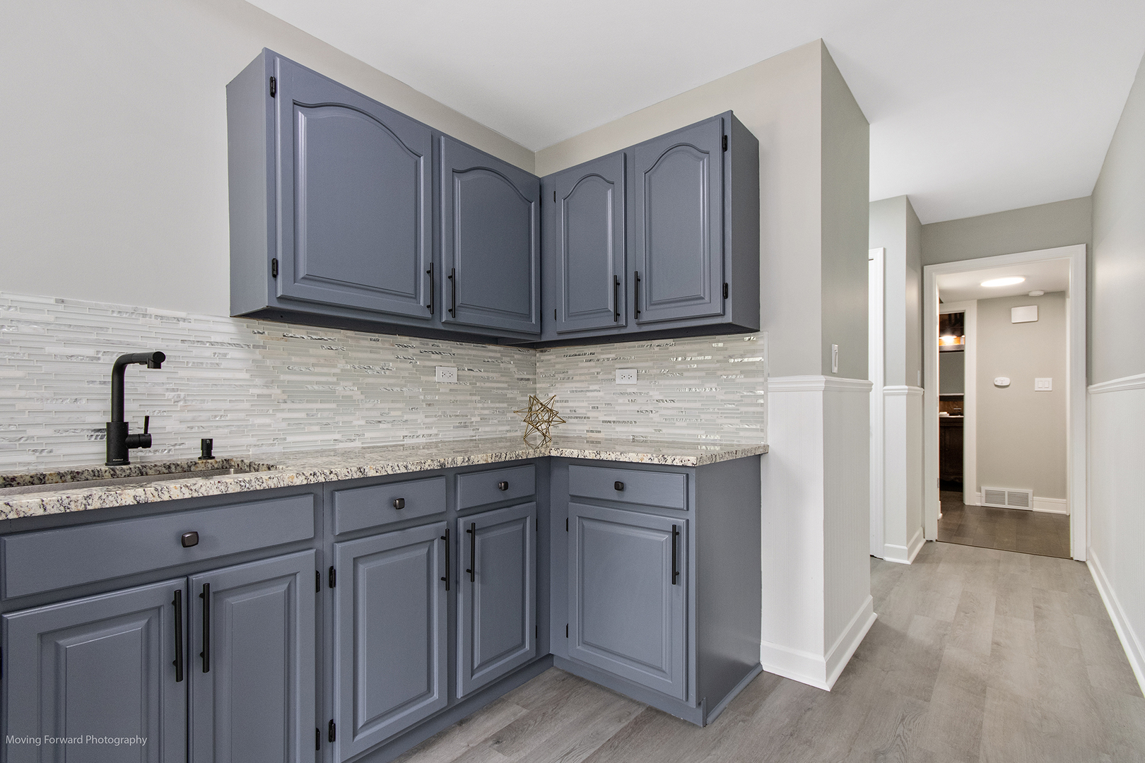 461 Huntley Road Crystal Lake, IL 60014 - Photo 16 of 45 a kitchen with stainless steel appliances granite countertop a sink and wooden cabinets