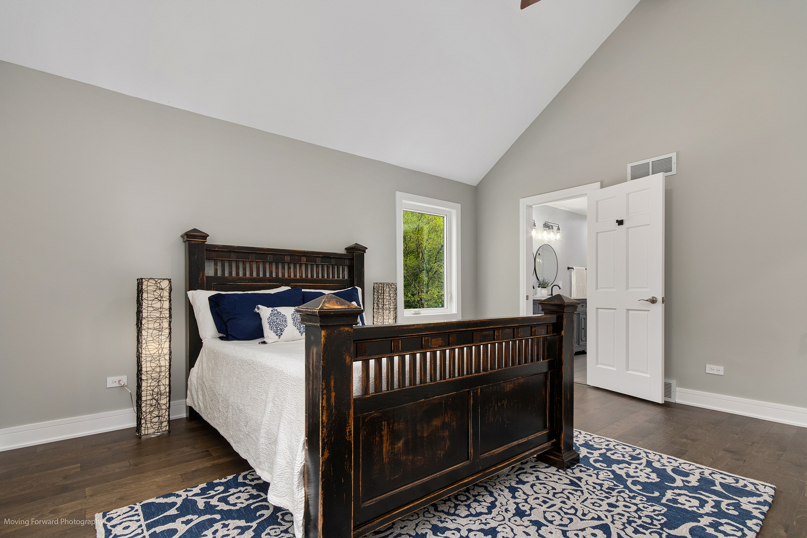 461 Huntley Road Crystal Lake, IL 60014 - Photo 19 of 45 a bed sitting in a bedroom next to a window