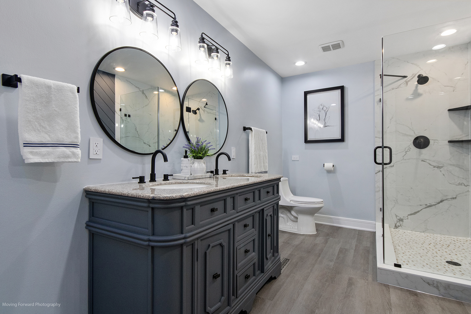 461 Huntley Road Crystal Lake, IL 60014 - Photo 20 of 45 a bathroom with a toilet a sink and mirror