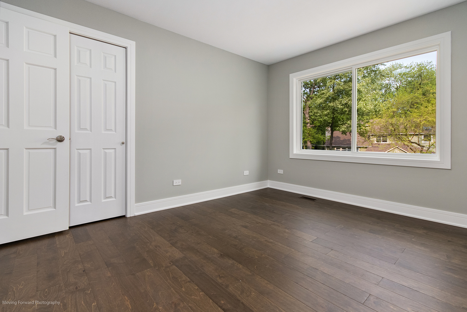 461 Huntley Road Crystal Lake, IL 60014 - Photo 24 of 45 an empty room with wooden floor and windows