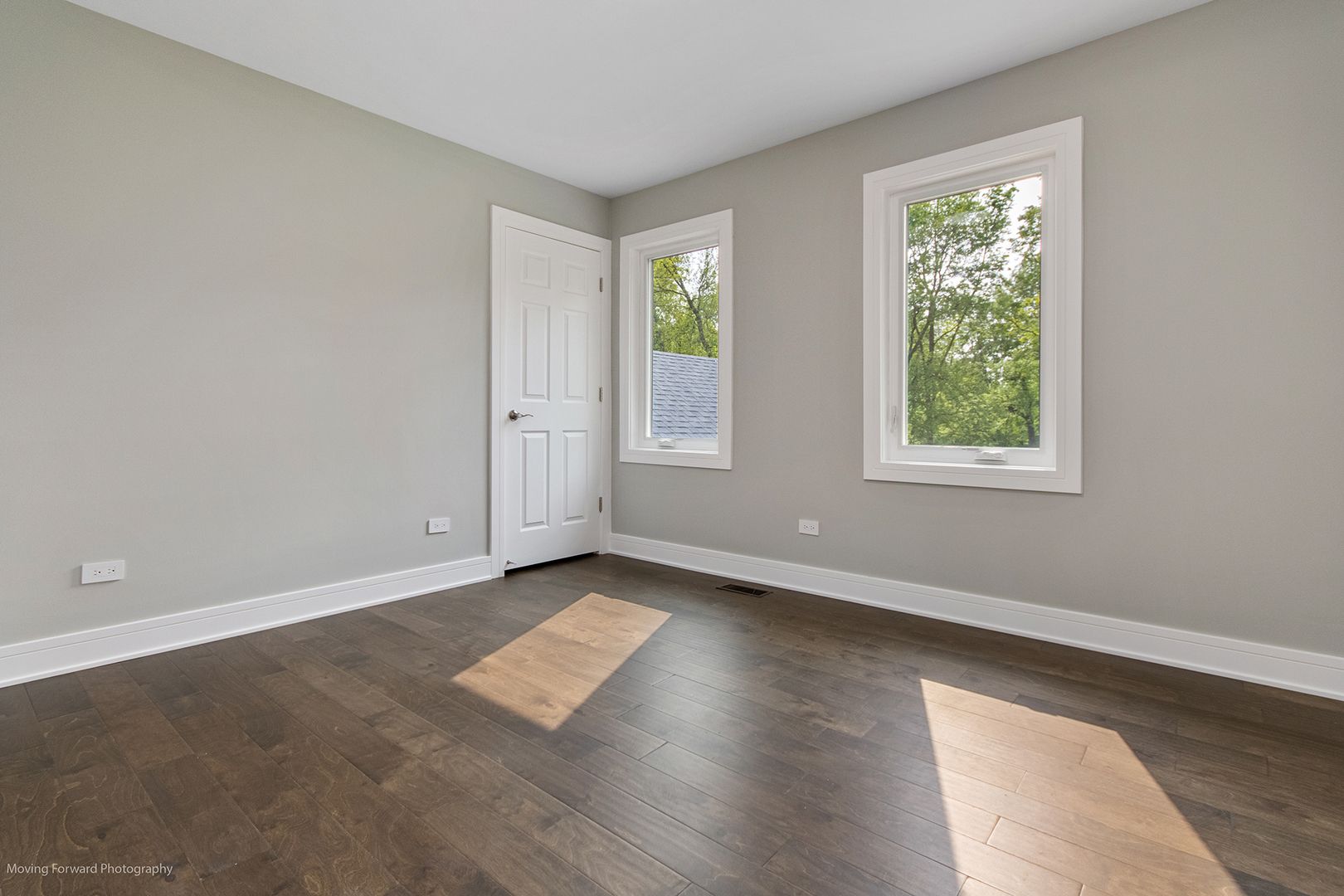 461 Huntley Road Crystal Lake, IL 60014 - Photo 25 of 45 an empty room with wooden floor and windows