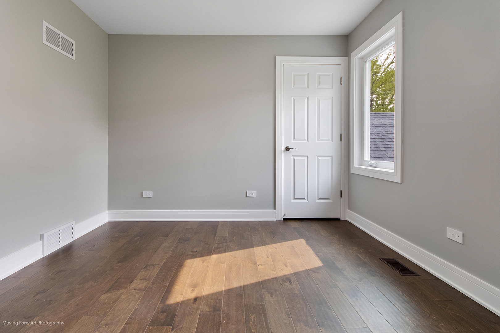 461 Huntley Road Crystal Lake, IL 60014 - Photo 26 of 45 an empty room with wooden floor and windows