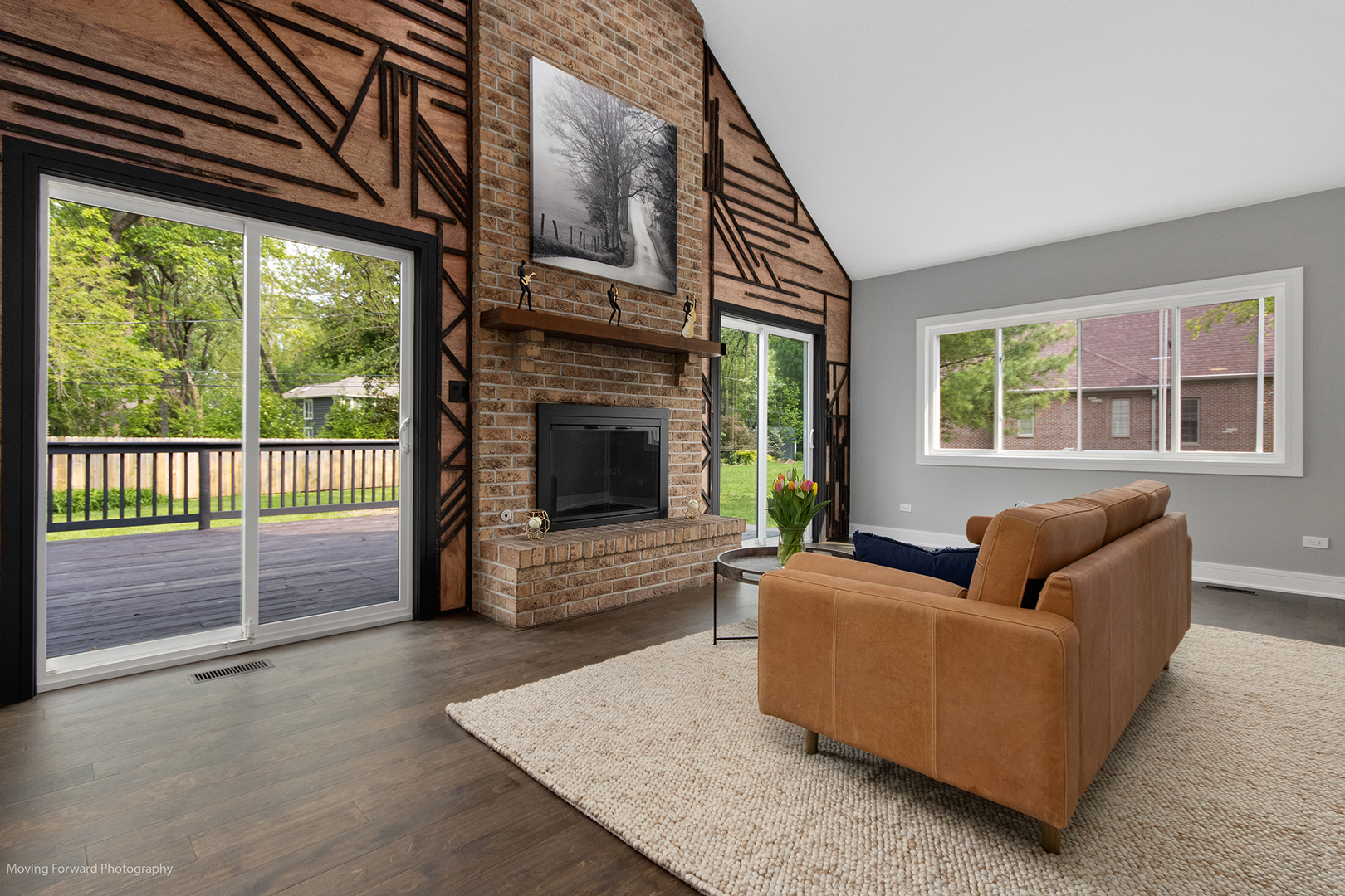 461 Huntley Road Crystal Lake, IL 60014 - Photo 3 of 45 a living room with furniture a fireplace and a large window