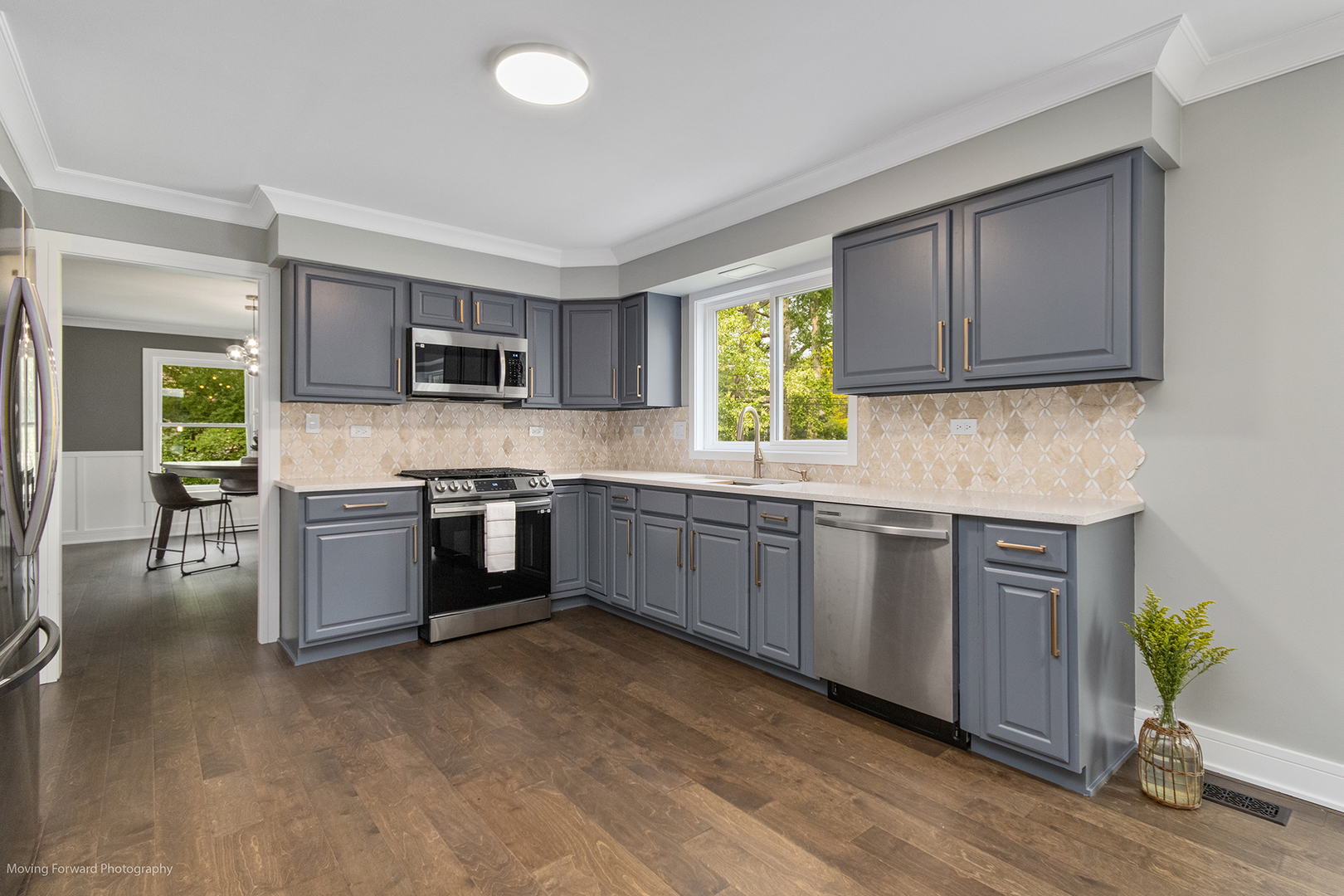 461 Huntley Road Crystal Lake, IL 60014 - Photo 5 of 45 a kitchen with a sink cabinets and stainless steel appliances