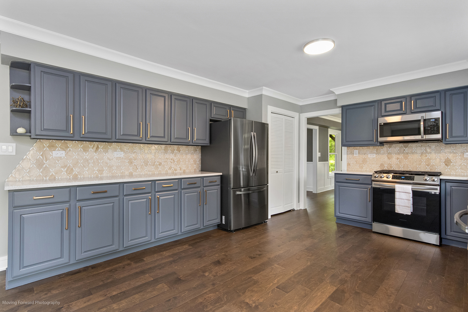461 Huntley Road Crystal Lake, IL 60014 - Photo 6 of 45 a kitchen with stainless steel appliances granite countertop a stove top oven a refrigerator and a sink