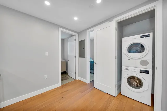 a view of a storage & utility room with a washer and dryer