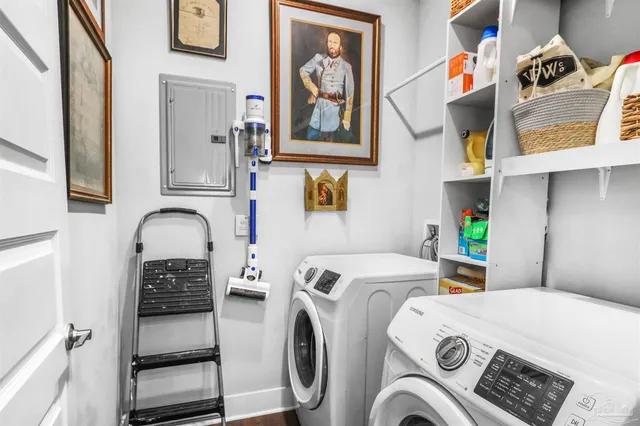 a utility room with dryer and washer