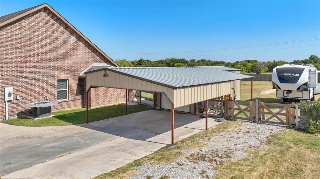 117 Heather Lane Decatur, TX 76234 - Photo 27 of 34 Carport attched to workshop