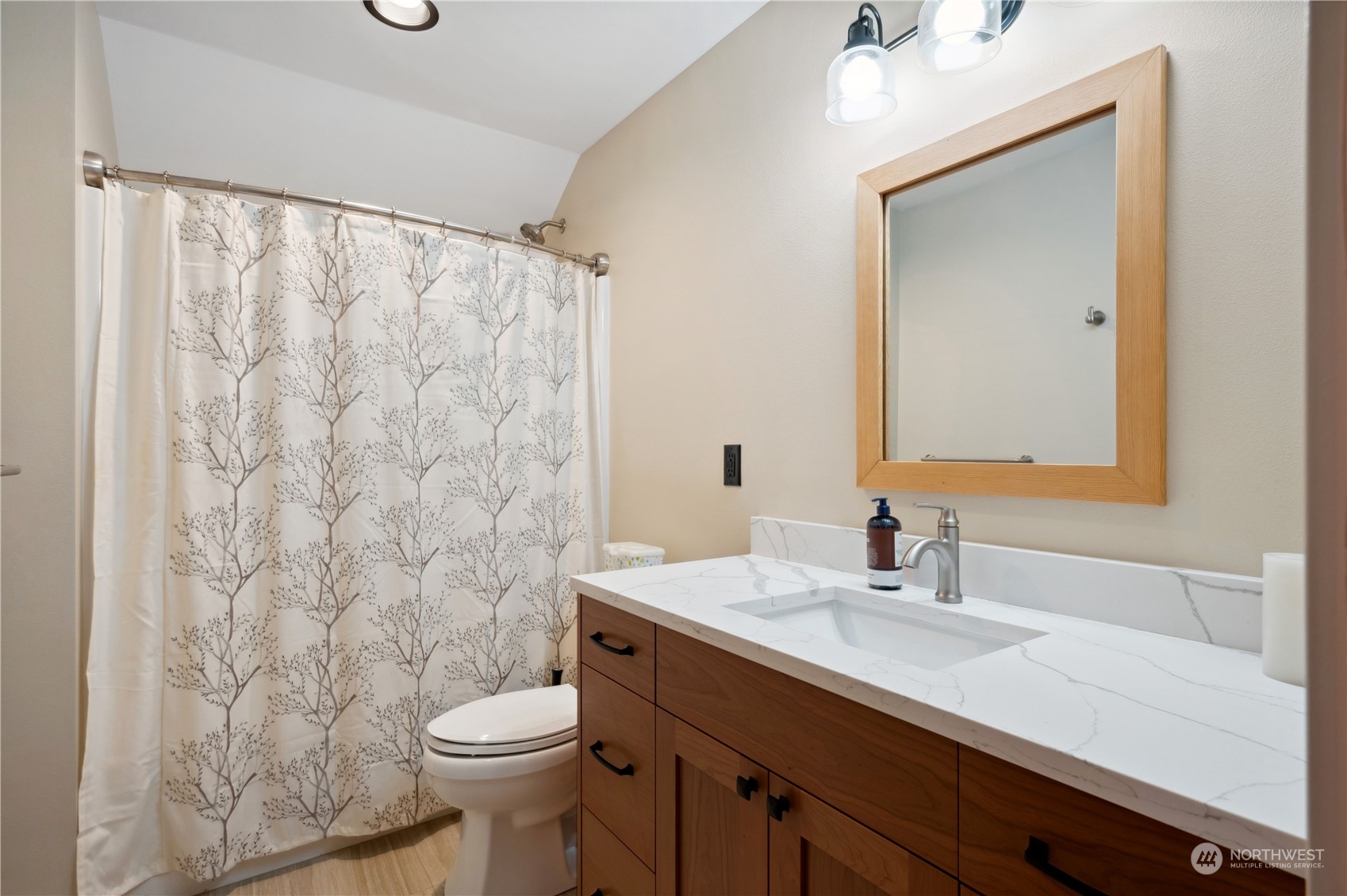 1680 Butler Creek Road Sedro-Woolley, WA 98284 - Photo 32 of 40 a bathroom with a sink a toilet and a mirror