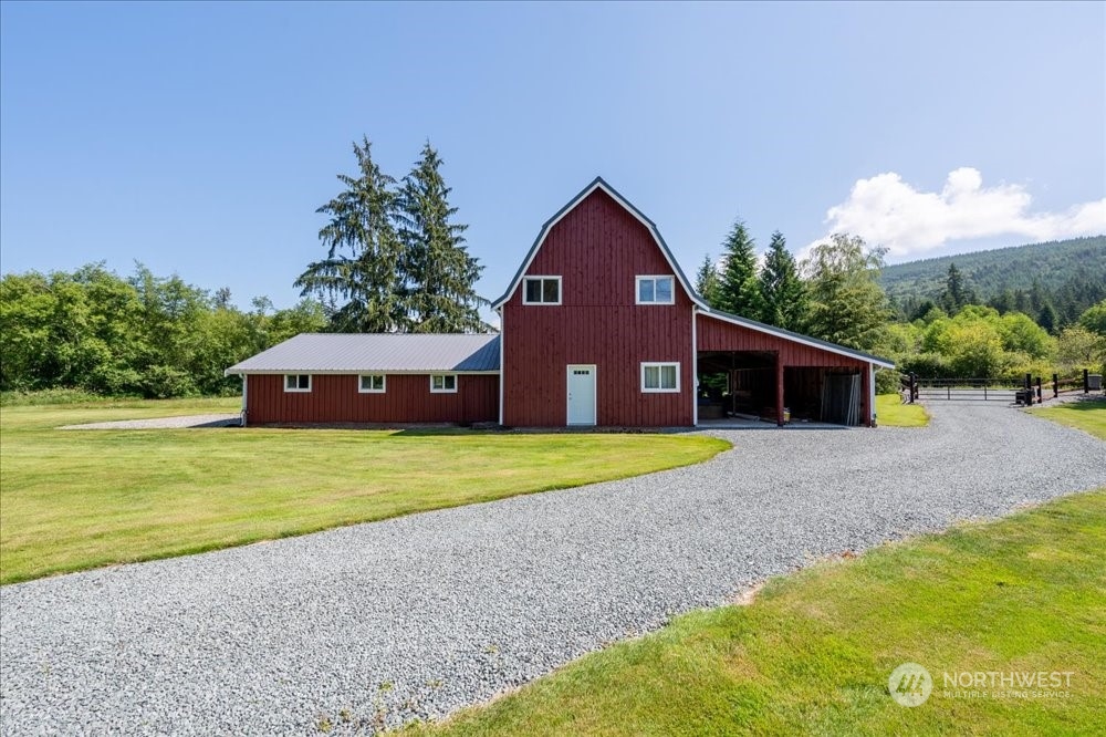 1680 Butler Creek Road Sedro-Woolley, WA 98284 - Photo 35 of 40 a front view of a house with a yard and garage