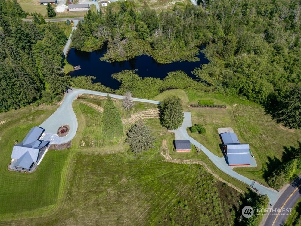1680 Butler Creek Road Sedro-Woolley, WA 98284 - Photo 37 of 40 an aerial view of a house with outdoor space