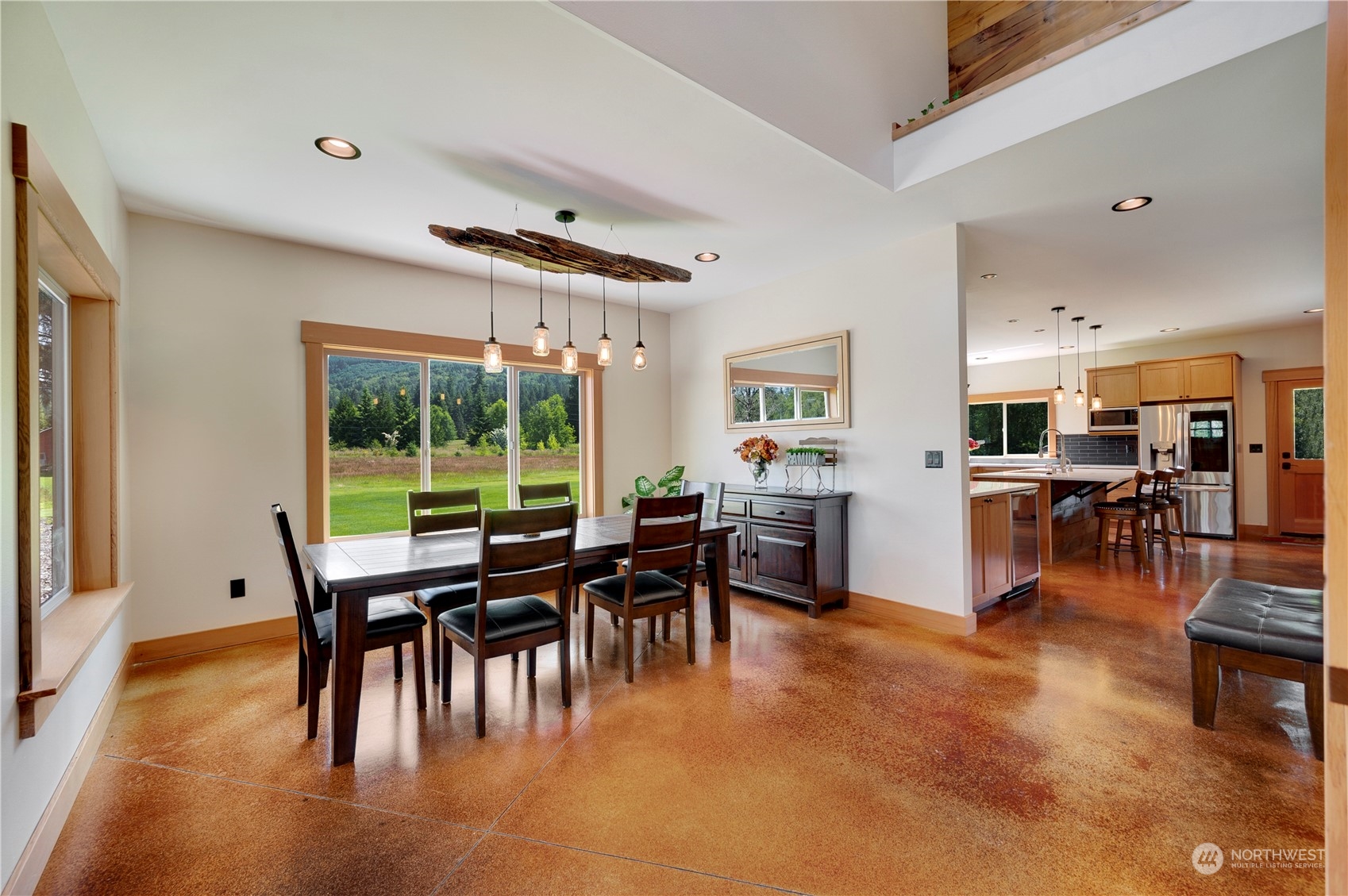1680 Butler Creek Road Sedro-Woolley, WA 98284 - Photo 8 of 40 a dining room with furniture and wooden floor