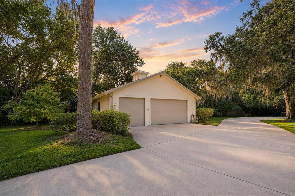 17810 Crawley Road Odessa, FL 33556 - Photo 6 of 76 a front view of a house with yard and green space