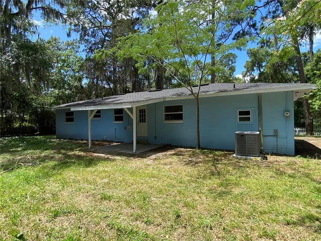 a house with yard in front of it