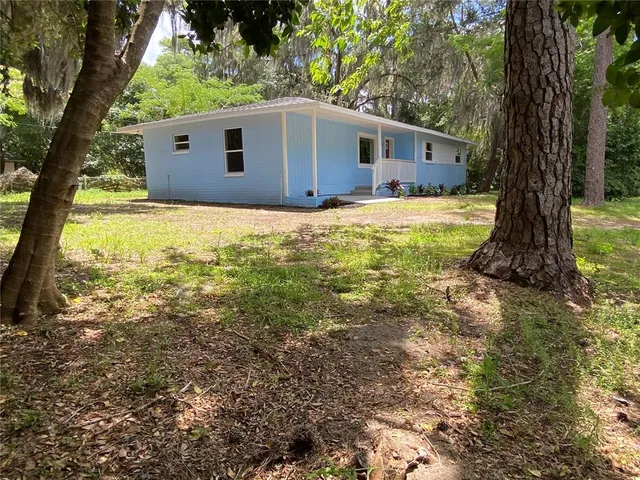 a house view with a garden space