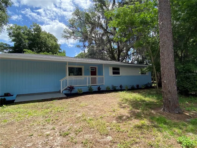 a house view with a garden space