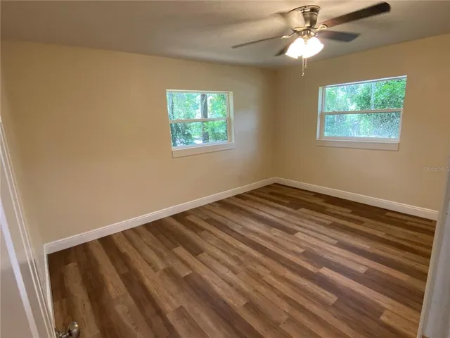 an empty room with windows