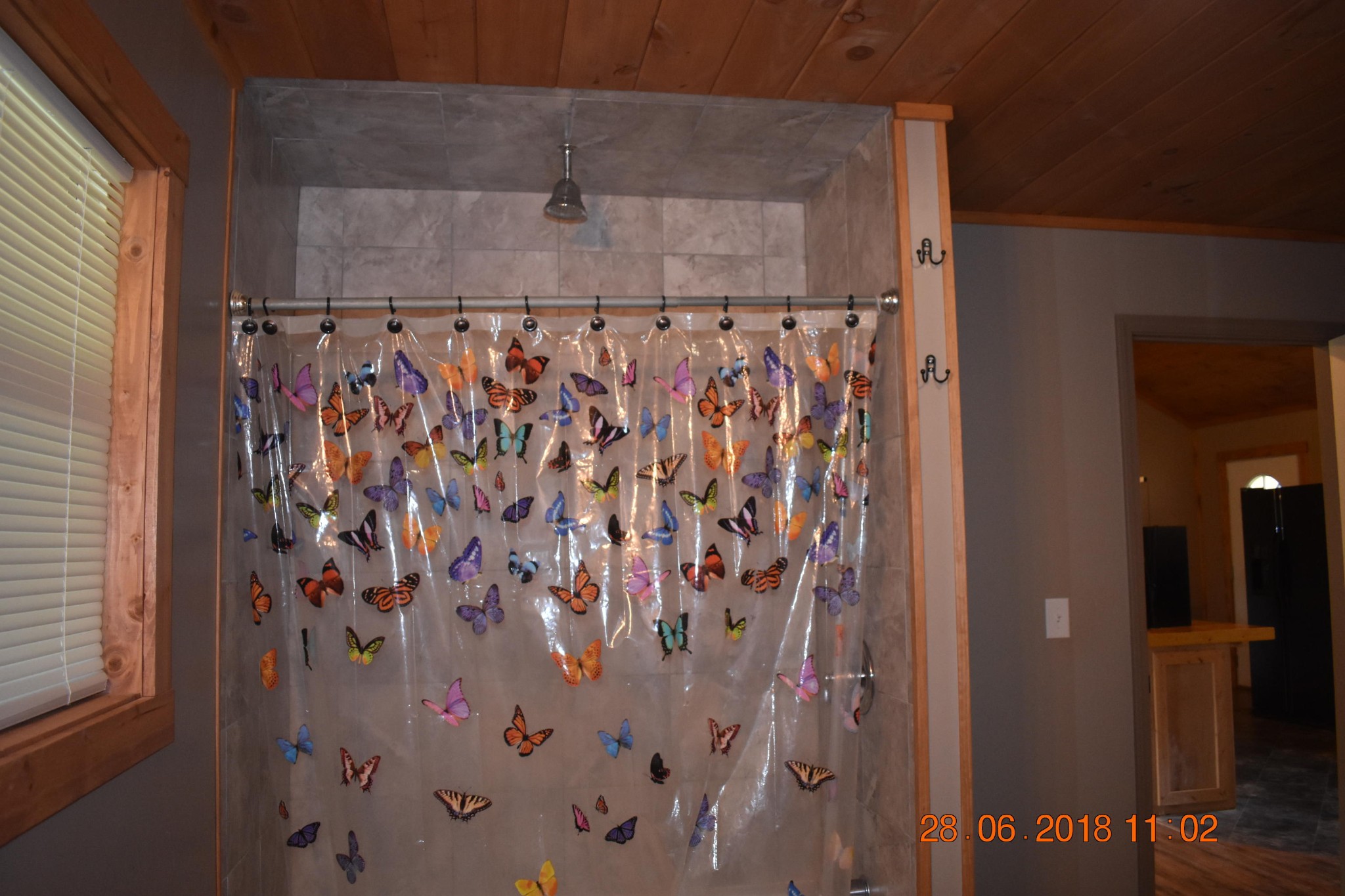 1176 Helton Road Bean Station, TN 37708 - Photo 29 of 37 a bathroom with a shower curtain and a shower curtain