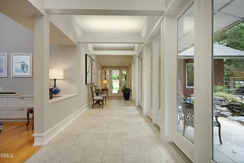 a kitchen with a cabinets and wooden floor