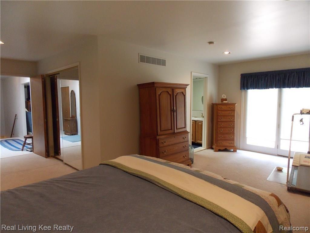 1970 Moffat Road Leonard, MI 48367 - Photo 24 of 45 Master Suite