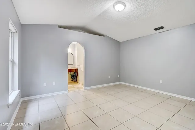 a view of an empty room with window
