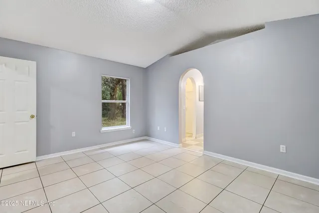 a bath room with a sink and a bath tub