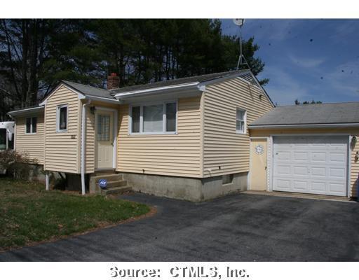 104 Flanders Road Stonington, CT 06378 - Photo 1 of 1 a view of a house with backyard and garden