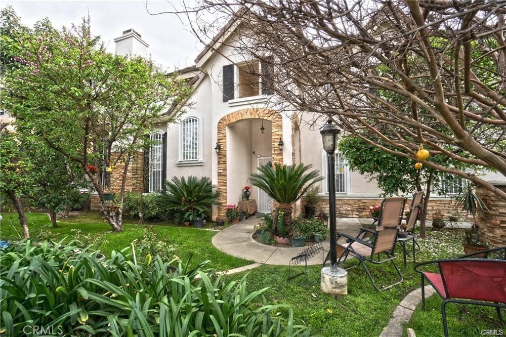 9532 Cortada Street El Monte, CA 91733 - Photo 1 of 10 a front view of a house with a yard