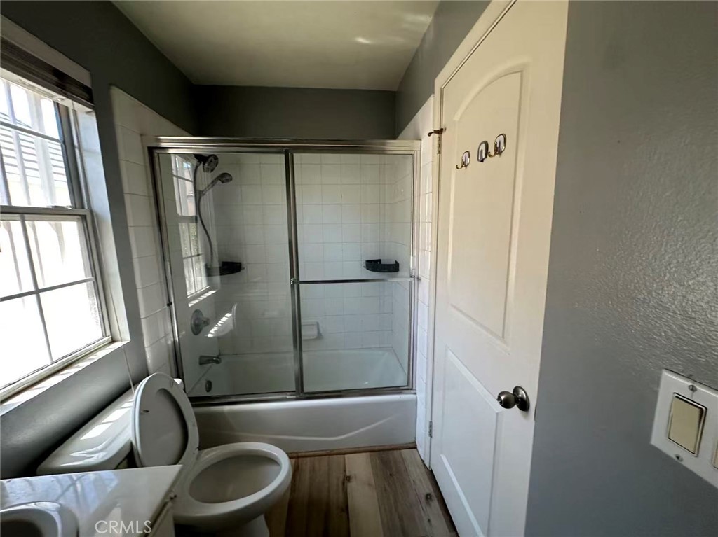 9532 Cortada Street El Monte, CA 91733 - Photo 10 of 10 a bathroom with a sink a toilet and shower