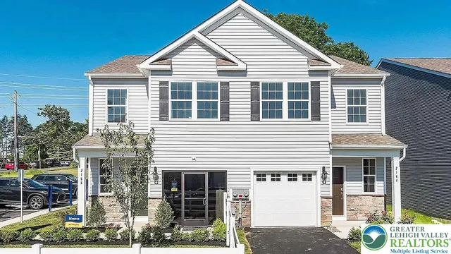 a view of a house with a porch