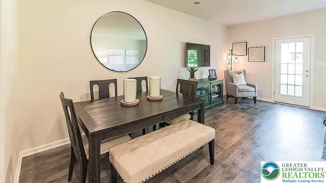 a kitchen with wooden cabinets and a stove top oven