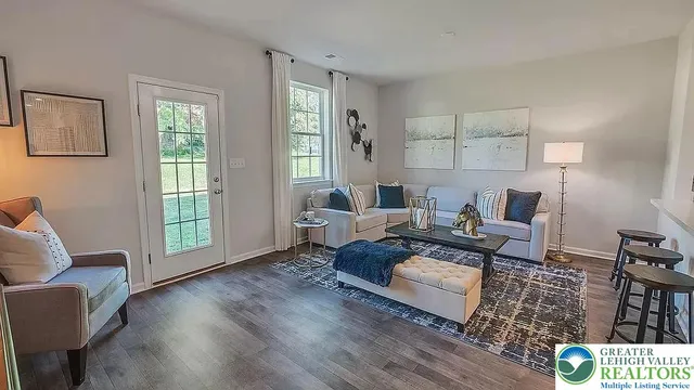 a bedroom with a bed and a mirror