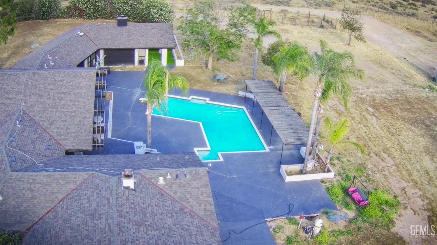 Undisclosed Address Bakersfield, CA 93308 - Photo 7 of 29 a view of an house with a yard