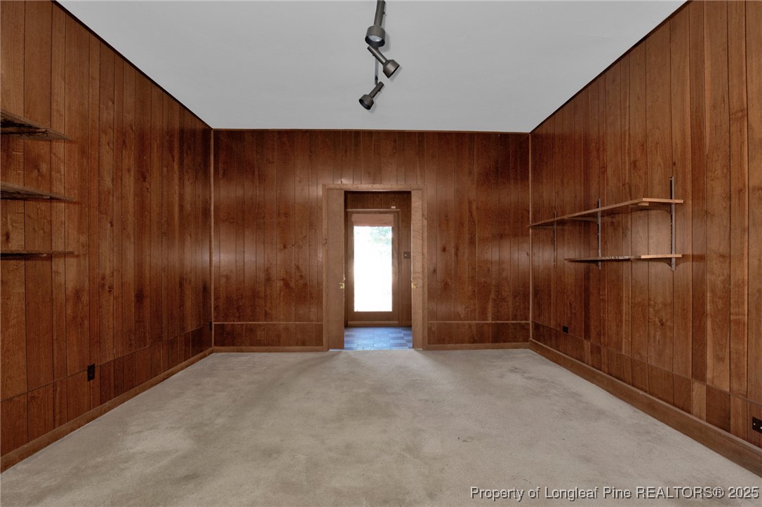 549 Rainforest Road Hope Mills, NC 28348 - Photo 16 of 40 a view of entryway with wooden walls